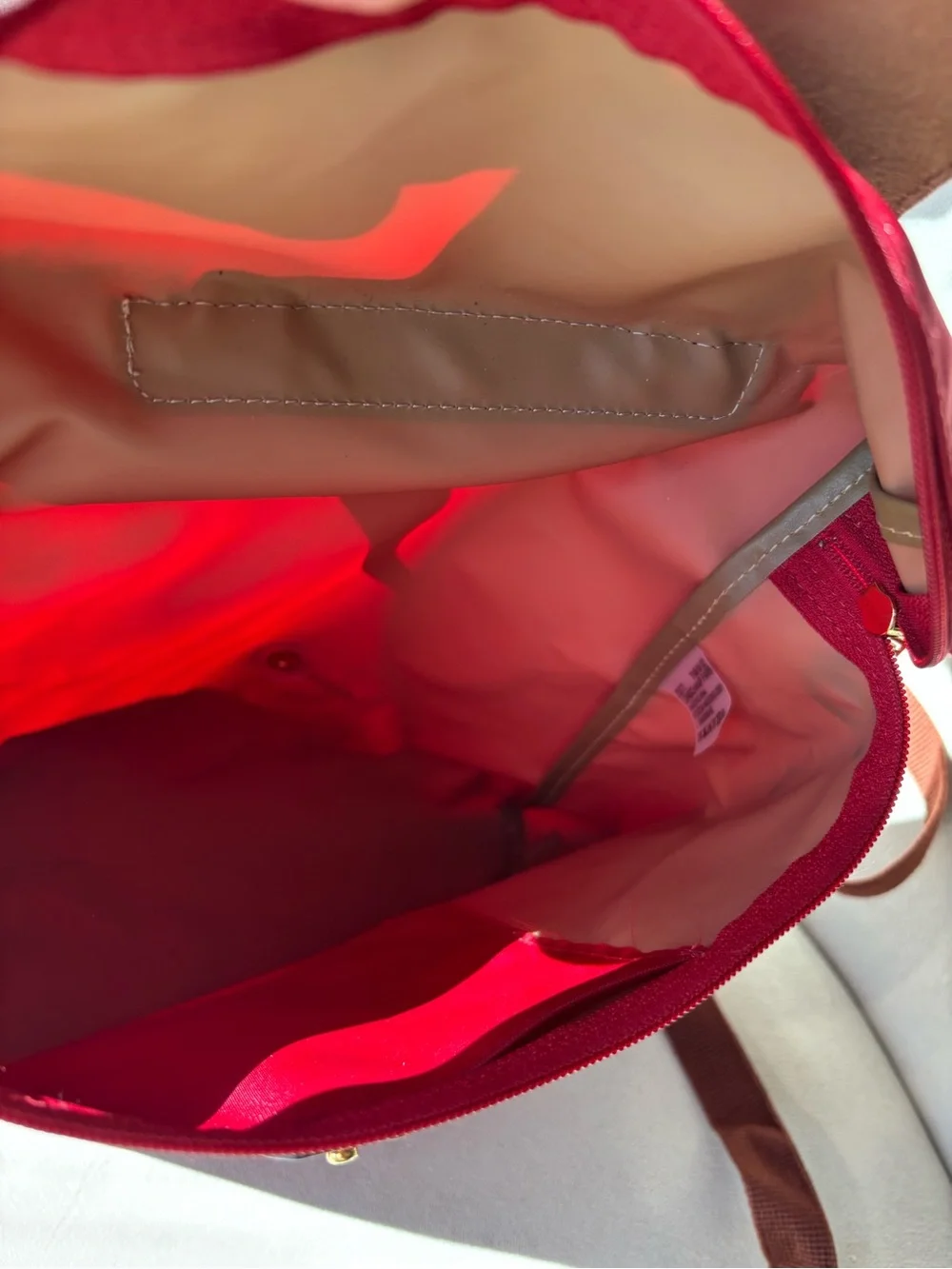 Longchamp Le Pliage Red Women's Nylon Backpack with Brown Leather Flap